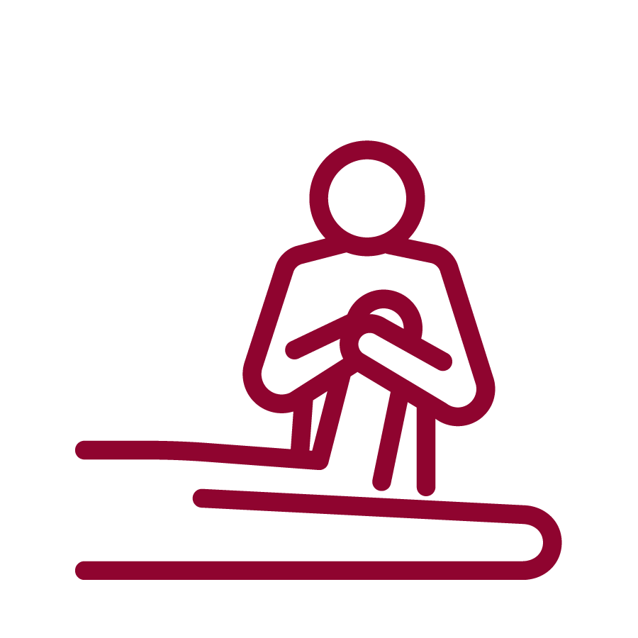 Symbolgrafik: Massage des Fußes einer auf dem Bauch liegenden Person
